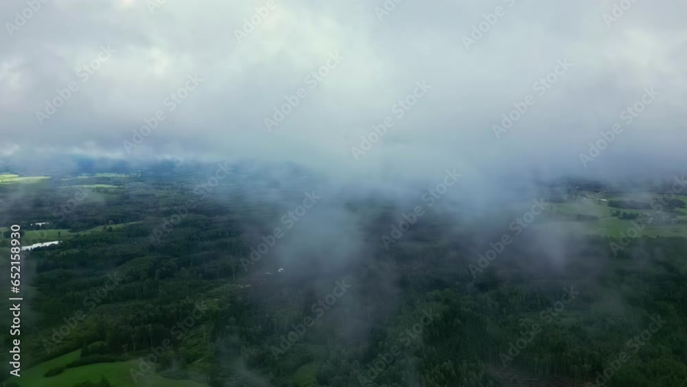 Drone’s Eye View: Clouds Over Green Forest Drone’s Eye View: Clouds Over Green Forest