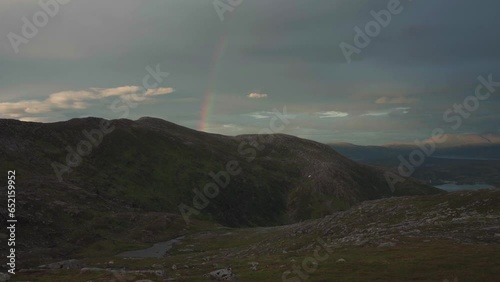 Rainbow Over Grytetippen Peak In Senja, Fjordgard, Norway. Static Shot photo