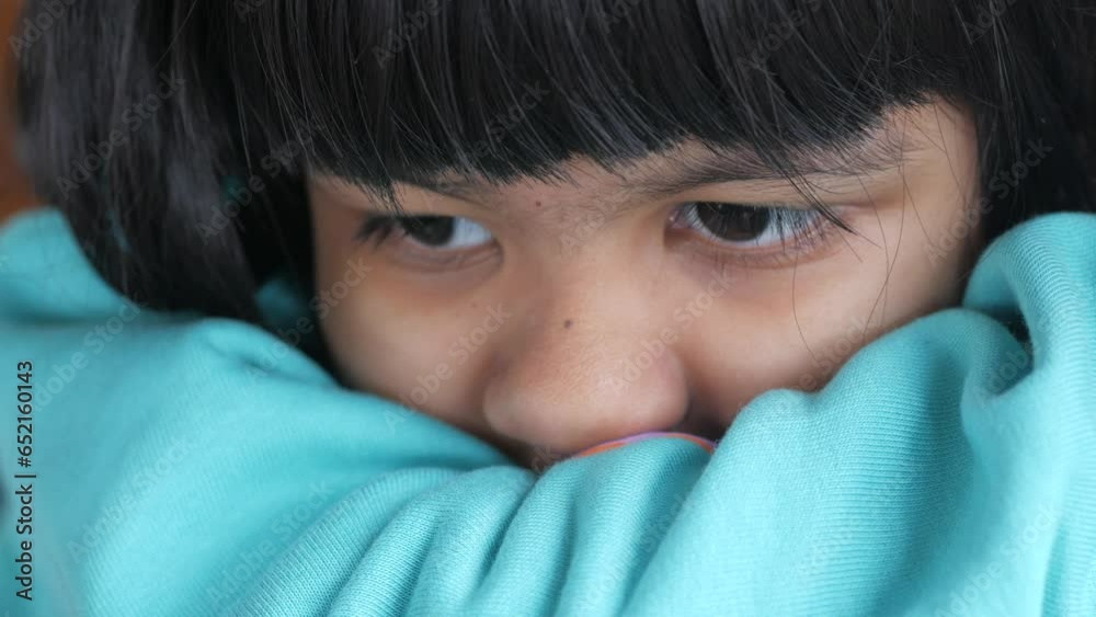 a upset child girl cover her face with hand Stock Video Adobe Stock