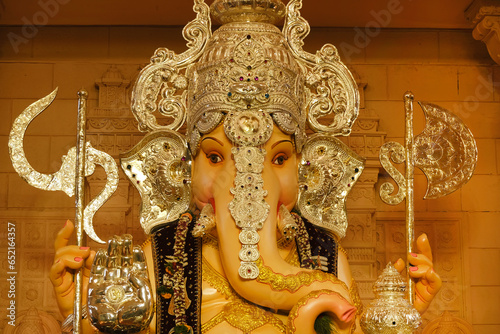 19 September 2023, Pune, Maharashtra, India, Huge idol of Lord Ganesh installed by Tulshibaug Mandal during Ganesh festival 2023. photo