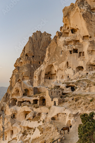 Uchhisar Cave City at sunset in Cappadocia photo