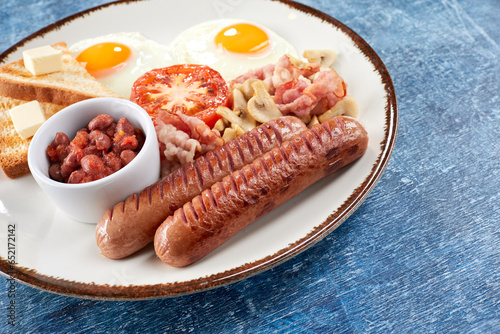 traditional breakfast with beans and sausage