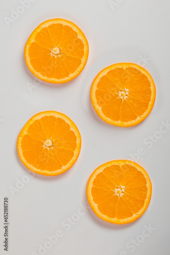 Orange slice isolate. Orange fruit half and slice set on white background.