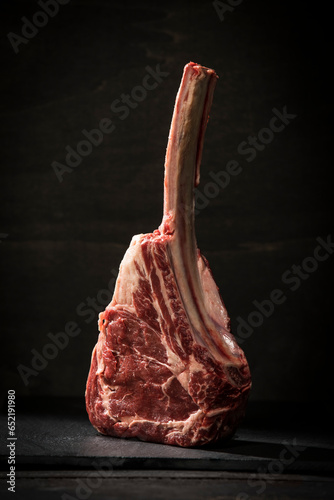 Raw tomahawk steak