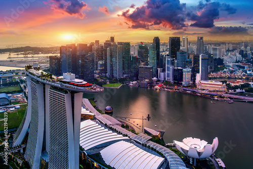 Photography Aerial view of Singapore city at sunset.