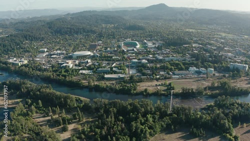 An establishing shot of the Willamette River and the University of Oregon campus.
