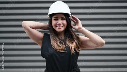 portrait of a woman using a safety halmet photo