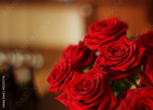 A bouquet of red roses. Space for text.