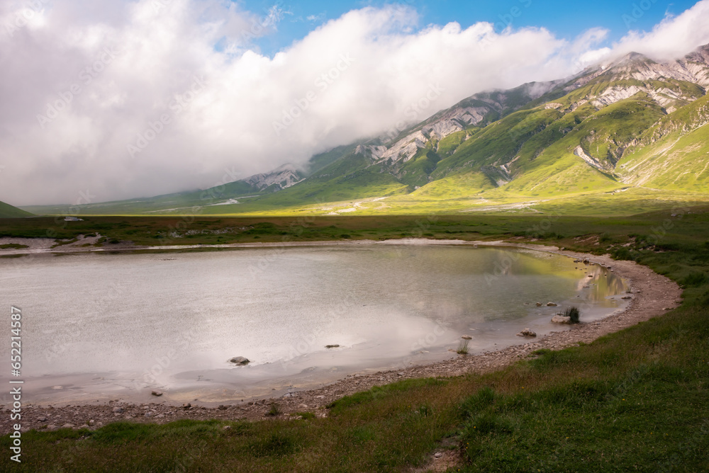 Small mountain lake in summer, natural landscape
