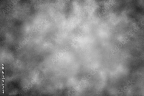 An abstract gray background in the form of a swirling fog.
