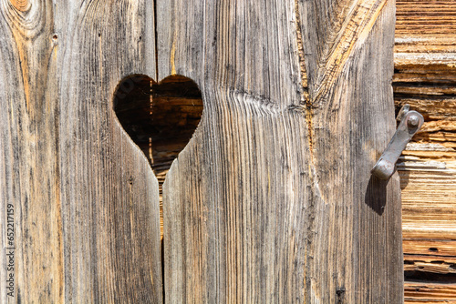 heart and old brown rustic dark grunge wooden texture - wood Background banner.