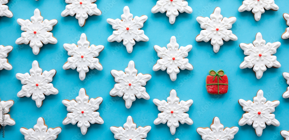 Gingerbread in the form of snowflakes on a blue background. Gingerbread in the form of snowflakes on a blue background.