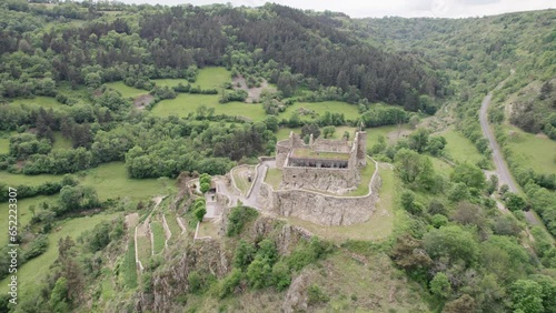 Wallpaper Mural Aerial View of Medieval Castle Seating on Hilltop Overlooking a Lush Valley Torontodigital.ca