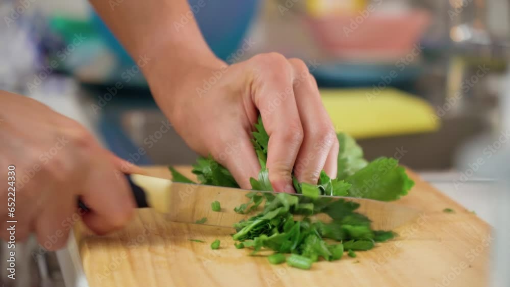 Sliced fresh celery or Celery, men's hands cut. Cooking healthy food Sliced fresh celery or Celery, men's hands cut. Cooking healthy food