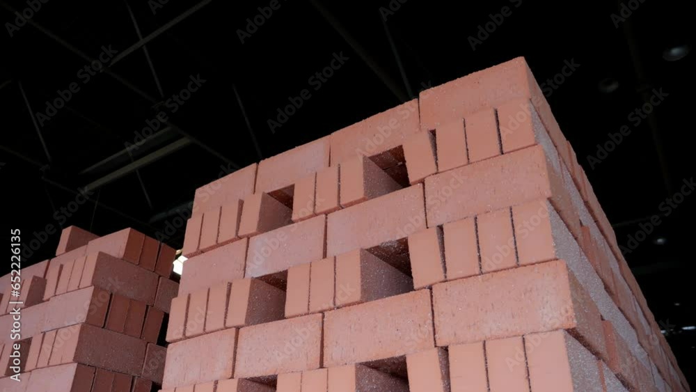 bricks stacked on top of each other warehouse with bricks bricks stacked on top of each other warehouse with bricks