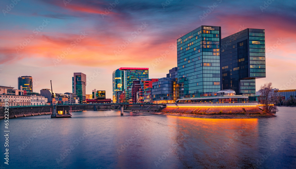 Incredible autumn sunset on the Rhein river. Spectacular evening cityscape of Dusseldorf with Medienhafen, Nordrhein-Westfalen, Germany, Europe. Traveling concept background.. - obrazy, fototapety, plakaty 