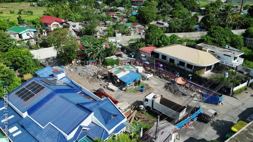 Aerial dolly of small building construction site in a rural community town of Legazpi, Albay. photo