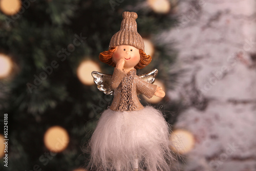 angel with beanie on christmas decoration photo