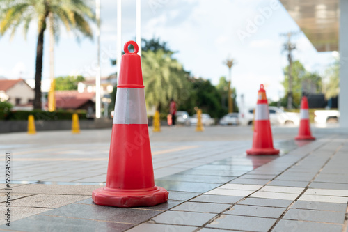 orange traffic cone on park in  supermarket