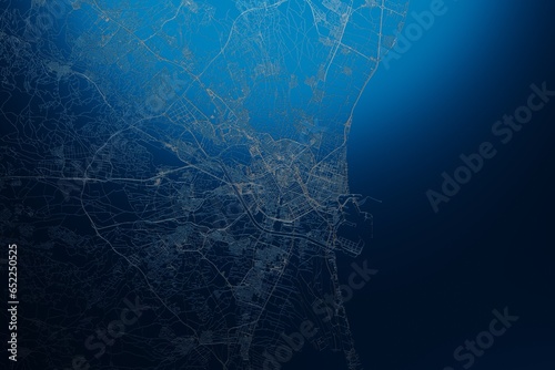 Street map of Valencia (Spain) engraved on blue metal background. View with light coming from top. 3d render, illustration photo