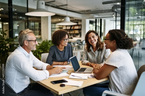 Cheerful design professionals having a meeting in an office