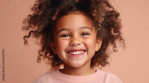 Sweet multicultural child with a bright smile.