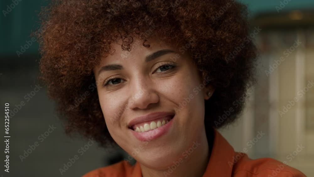 Black Woman Portrait. Confident African American female smiling looking at camera. Black Woman Portrait. Confident African American female smiling looking at camera.