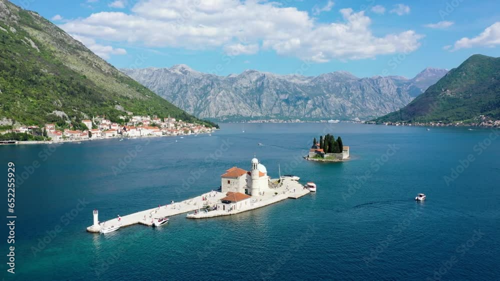 Saint George Island and Church of Our Lady of the Rocks in Perast, Montenegro. Our Lady of the Rock island and Church in Perast on shore of Boka Kotor bay (Boka Kotorska), Montenegro, Europe.