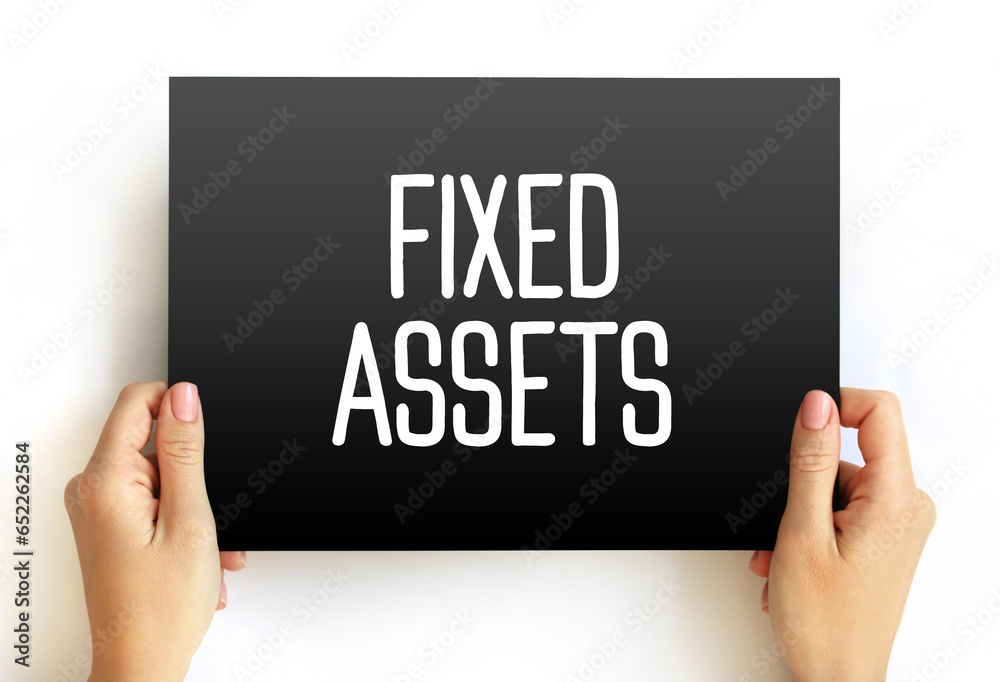 Fixed Assets - long-term tangible piece of property or equipment that a firm owns and uses in its operations to generate income, text concept on card Fixed Assets - long-term tangible piece of property or equipment that a firm owns and uses in its operations to generate income, text concept on card