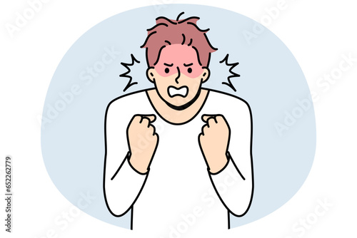 Furious young man clench fists struggle with madness or panic. Angry male feeling emotional and enraged. Rage and emotion control. Vector illustration. photo