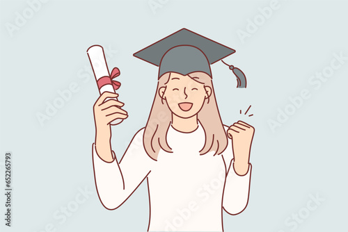 Graduate girl in university student hat after passing exams and holds certificate of education