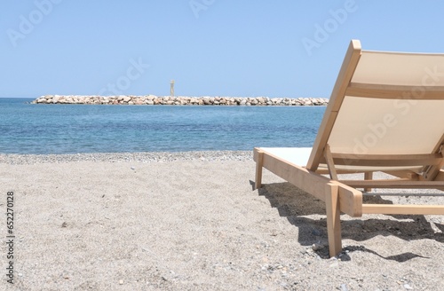 Sun chair on a greek beach in Crete.