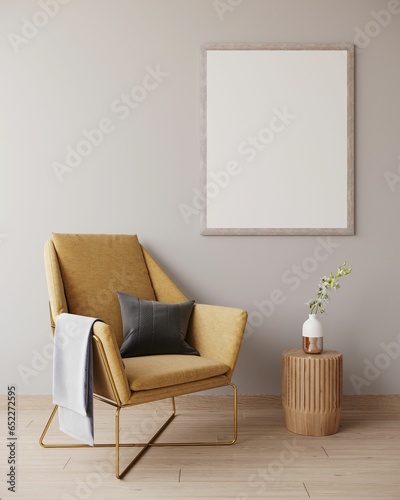 Fototapeta Naklejka Na Ścianę i Meble -  Yellow armchair in a grey room with a picture frame adjacent to it, providing a copy space
