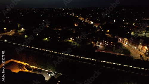 High Angle View of South East Downtown and Central Luton City and Commercial District After Sunset and During Night. The Image Was Captured With Drone's Camera on September 5th, 2023 photo