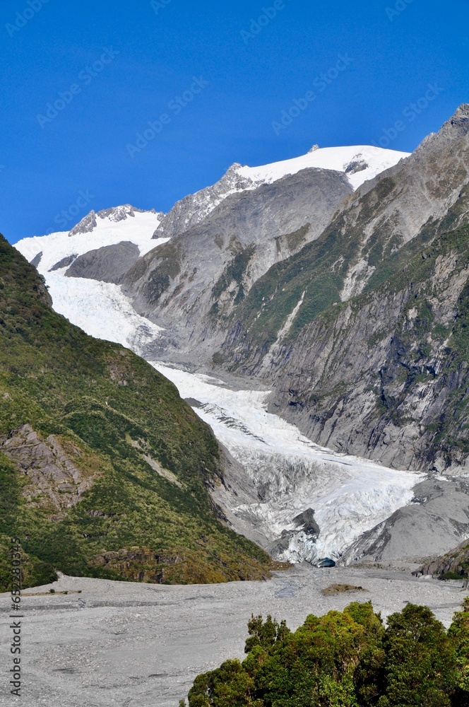 Scenic vertical shot of the Franz Josef glacier in New Zealand