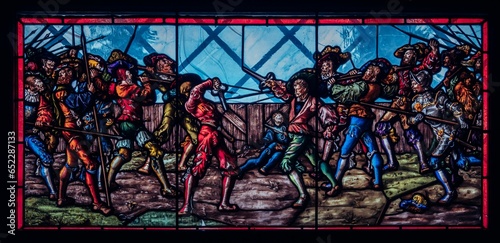 Illustration of two emperors locked in a fierce battle, depicted in a stained glass window