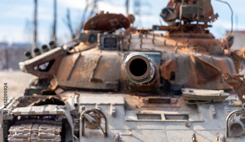 damaged military tank on a city street in Ukraine