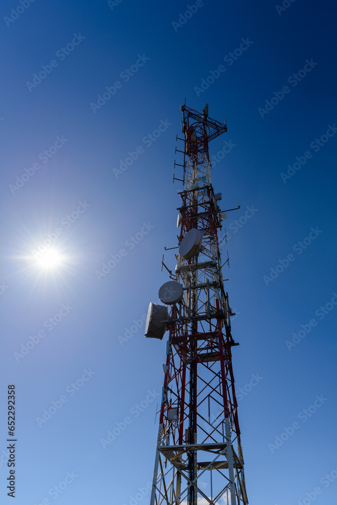 telecommunication antenna against blue sky