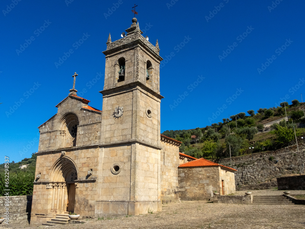 Facade of the Romanesque Church of Santa María de Barrô (12th century). The bell tower was built in the 19th century. Duero valley, Resende, Portugal.