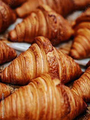 Fresh baked croissants. Warm fresh croissants with crispy crust closeup