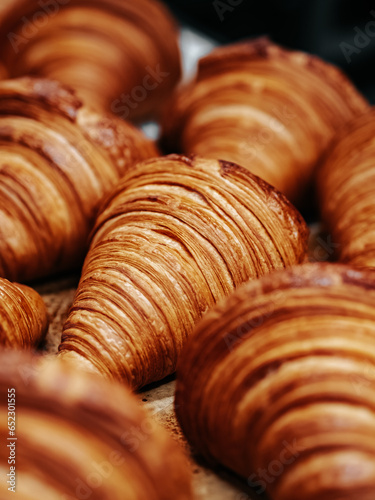 Fresh baked croissants. Warm fresh croissants with crispy crust closeup