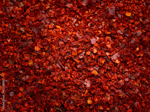 Fototapeta Naklejka Na Ścianę i Meble -  Crushed red pepper macro texture