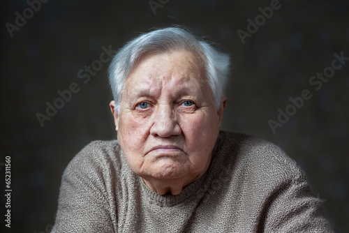 Elderly woman in the studio