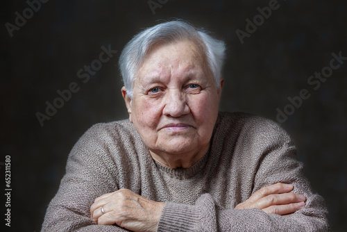 Elderly, smile woman in the studio