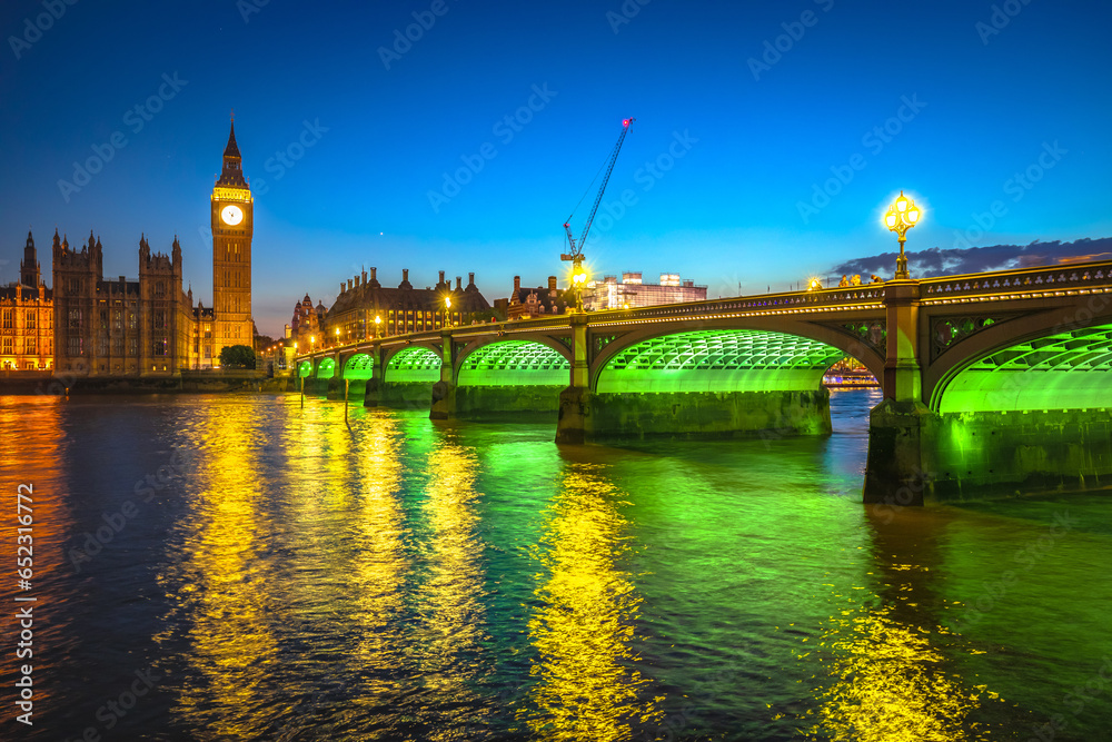 Palace of Westminster and Big Ben sundown view from Thames river, capital of UK famous landmark