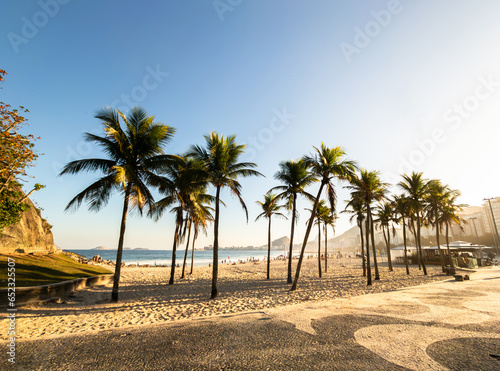 Sunset view at Leme beach with coconut trees in Rio de Janeiro Brazil photo