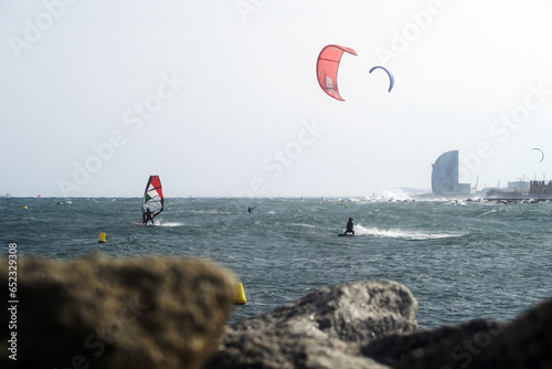 Photography Kite surfing on the sea near Barcelona beach