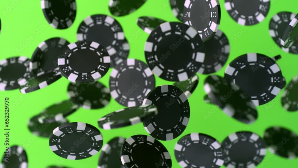 Super Slow Motion Shot of Casino Chips Explosion Towards Camera on Green Screen at 1000fps.
