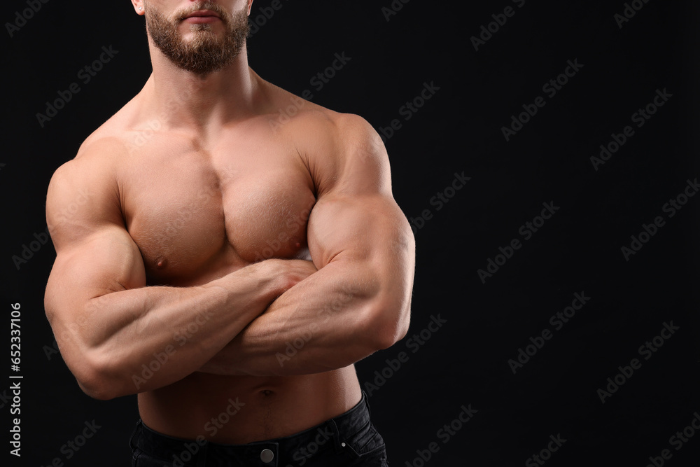 Muscular man on black background, closeup and space for text. Sexy body Muscular man on black background, closeup and space for text. Sexy body