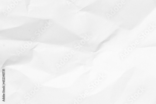 Grunge wrinkled white color paper textured background with copy space